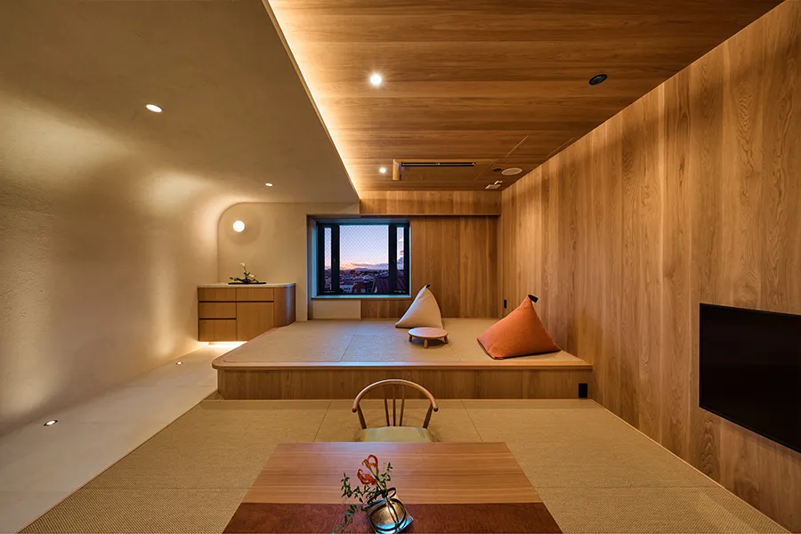 A modern Japanese-style room with a view of Mt. Ikoma Manyo